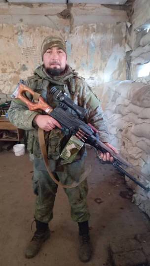 В администрации Севского района Исфандиёра Ходжаева наградили Георгиевским крестом IV степени